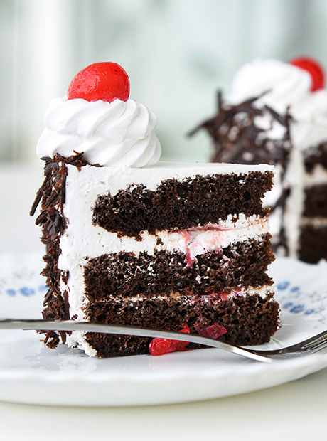 Whole Black Forest Cake Isolated on Black Background Stock Image - Image of  closeup, food: 122401047